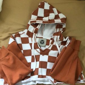 Urban Outfitters womens size Small cropped sweatshirt, orange/brown and white.